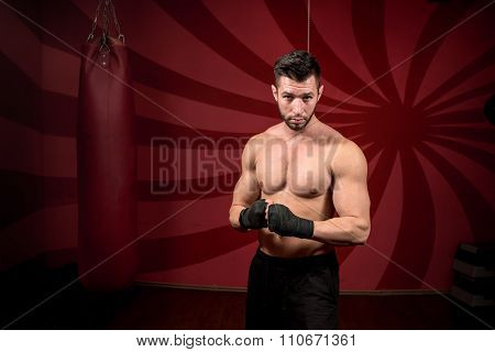 boxer and streetfighter preparing for match training and posing without gloves