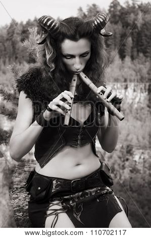 Pretty Female Faun Playing Flute