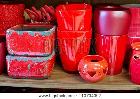Red Flowerpots In The Florist Store