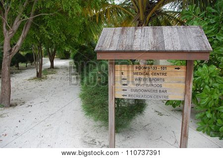 Timber Direction Signs At Bandos Island Maldives