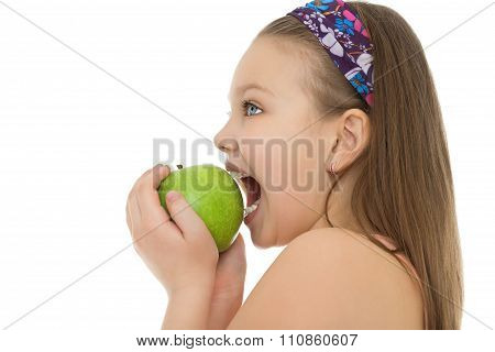 girl bites an Apple