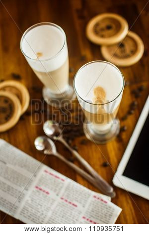 2 Latte On A Wooden Table