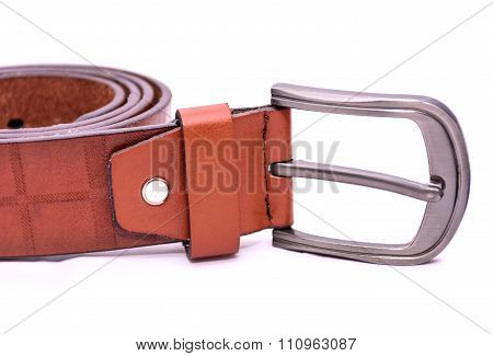 Brown belt who are separated by a white background.