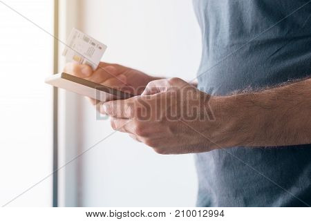 Man registering new GSM sim card on his personal mobile phone device
