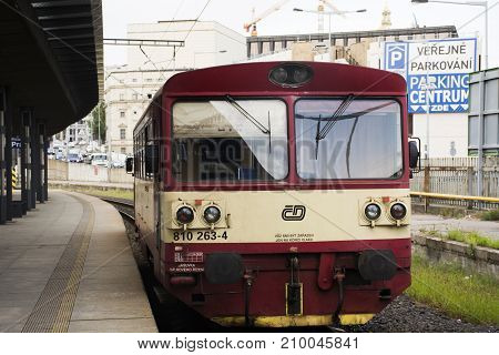 Red Classic And Retro Train Stop For Show Travelers People At Prague Main Railway Station Or Praha H