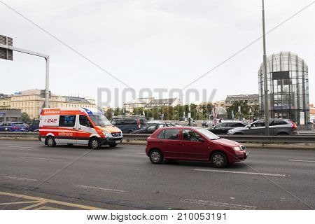 Traffic Road And Ambulance Van At Front Of Prague Main Railway Station Or Praha Hlavni Nadrazi