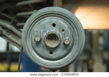 Close-up Repair Drum Brake Of Car Wheel In Garage.