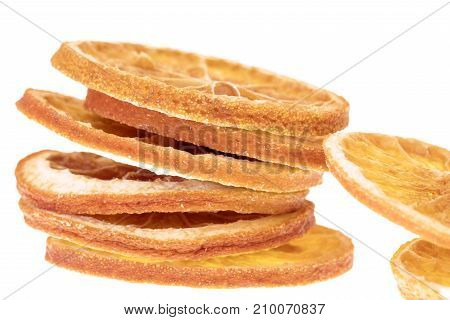 Stack of dried orange slices with two to side