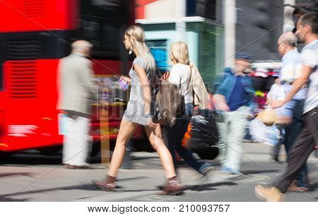 LONDON, UK - June 9, 2017: Blurred image of walking people at Oxford street, the main destination for shopping at Westend.