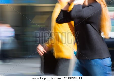 LONDON, UK - June 9, 2017: Blurred image of walking people at Oxford street, the main destination for shopping at Westend.