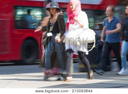LONDON, UK - June 9, 2017: Blurred image of walking people at Oxford street, the main destination for shopping at Westend.