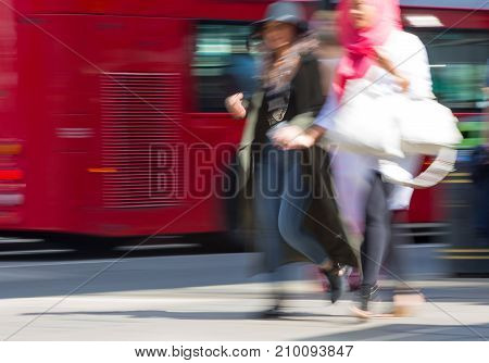 LONDON, UK - June 9, 2017: Blurred image of walking people at Oxford street, the main destination for shopping at Westend.