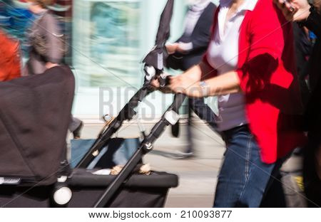LONDON, UK - June 9, 2017: Blurred image of walking people at Oxford street, the main destination for shopping at Westend.