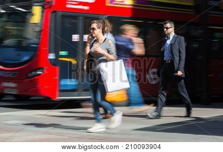LONDON, UK - June 9, 2017: Blurred image of walking people at Oxford street, the main destination for shopping at Westend.