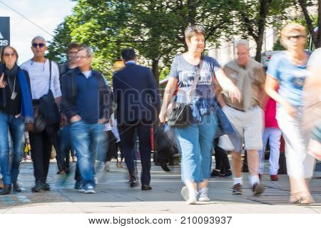 LONDON, UK - June 9, 2017: Blurred image group of walking people at Oxford street, the main destination for shopping at Westend.