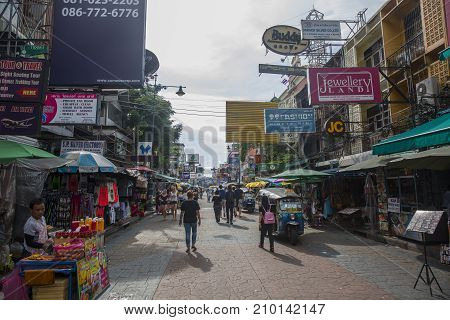 Bangkok Thailand - October 20 2017: People walking on Khao San Road in the evening. Khao San Road is popular with budget travellers with many cheap guest houses inexpensive restaurants