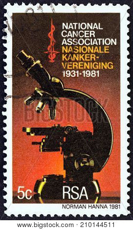 SOUTH AFRICA - CIRCA 1981: A stamp printed in South Africa issued for the 50th anniversary of National Cancer Association shows Microscope, circa 1981.