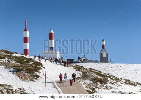 NAVACERRADA - JANUARY 4 2015: Tourists in Navacerrada Ski Resort Navacerrada Mountain Pass Madrid Spain on January 4 2015.