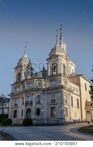 Facade of the Royal Palace of La Granja de San Ildefonso Segovia Spain. It is an 18th-century palace in a restrained baroque style surrounded by extensive gardens in the French manner and sculptural fountains