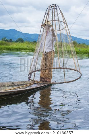 INLE LAKE MYANMAR - SEP 07 : Burmese fisherman at Inle lake Myanmar on September 07 2017 inle Lake is a freshwater lake located in Shan state
