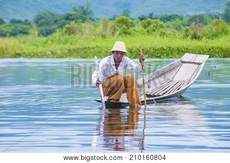 INLE LAKE MYANMAR - SEP 07 : Burmese fisherman at Inle lake Myanmar on September 07 2017 inle Lake is a freshwater lake located in Shan state