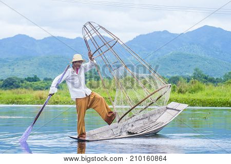 INLE LAKE MYANMAR - SEP 07 : Burmese fisherman at Inle lake Myanmar on September 07 2017 inle Lake is a freshwater lake located in Shan state