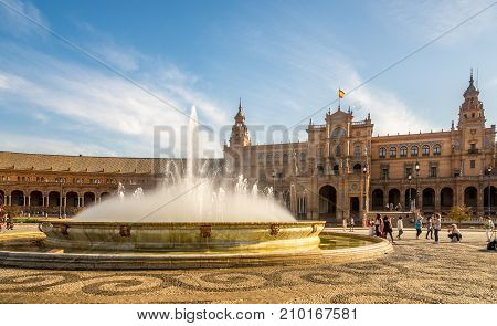 SEVILLA,SPAIN - OCTOBER 1,2017 - Fountain at the Place of Espana in Sevilla. Sevilla is situated on the plain of the river Guadalquivir.