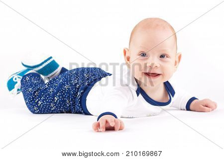 Happy Cute Little Boy In White Shirt And Trousers