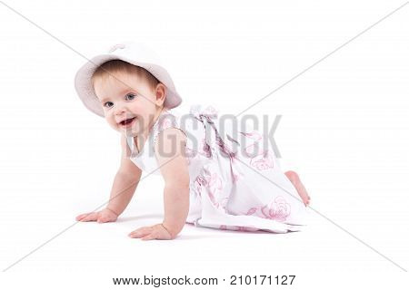Cute Cheerful Little Girl In Dress And Panama