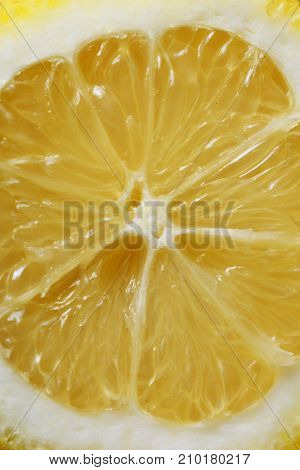 A cup of lemona cup of lemon on a wooden table