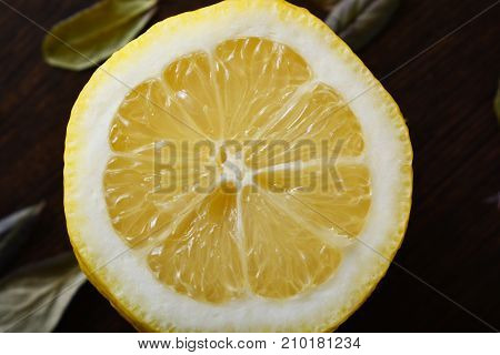 A cup of lemona cup of lemon on a wooden table