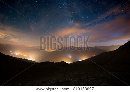 The Colorful Glowing Milky Way And The Starry Sky Over The French Alps And The Majestic Massif Des E