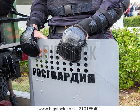 Russian riot police used shields. Text in russian: 