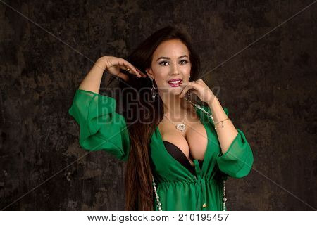 Beautiful Woman In Green Abaya.