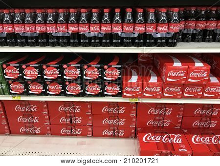 Altoona Wisconsin October 22 2017 Several Coca Cola boxes on a modern day Grocery store shelf