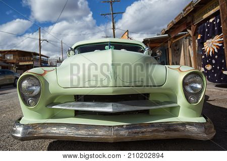November 10 2015 Oatman Arizona USA: collectors vintage automobile parked on the street of the popular tourist destination historic mining town