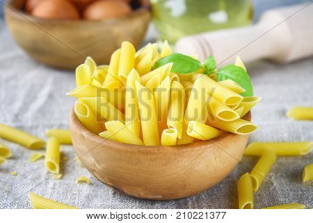 Penne Rigate. Macaroni In The Form Of Feathers. Mostaccioli Pasta