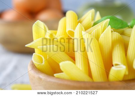 Penne Rigate. Macaroni In The Form Of Feathers. Mostaccioli Pasta