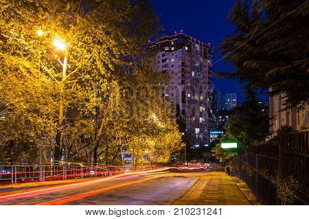 Beautiful view of illuminated Tonnelnaya street at dusk Sochi Russia