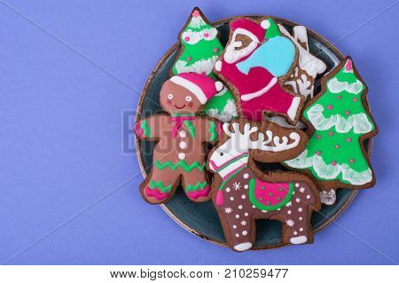 Beautiful and tasty Christmas pastries on bright background. Studio Photo