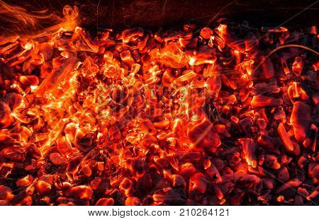 abstract background of burning coals . Photo of an abstract texture