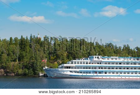 Island Valaam Russia - September 6 2017: White cruise ships are in the Bay of the island of Valaam. Nicholas Bay. in Valaam Russia