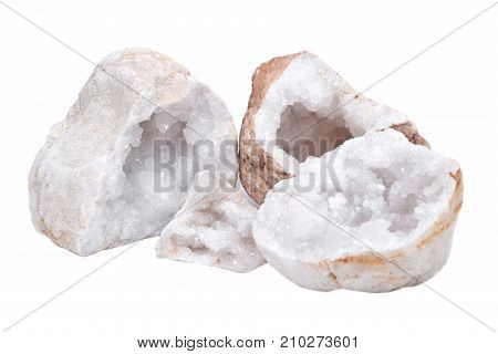 Collection of clear crystal quartz geodes with crystalline druzy center isolated on white background