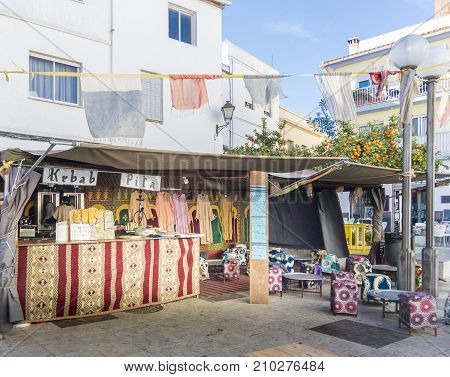 OLIVA, VALENCIA, SPAIN, 15TH JANUARY 2017 - Medieval market stall selling kebabs in Oliva Valencia Spain