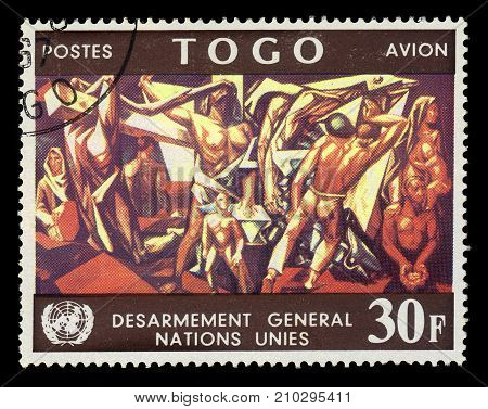 TOGO - CIRCA 1967: A stamp printed in Togo shows mural by spanish artist Jose Vela Zanetti in United Nations Conference Building, circa 1967