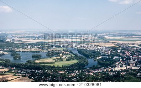 Lovosice city with its rural surrounding from Lovos hill in Ceske stredohori mountains in Czech republic