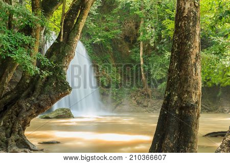 Erawan waterfall in the rainy season with turbid water