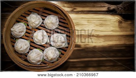 Delicious Taiwanese Styled Feshly Steamed Xiaolongbao in Bamboo Steamer