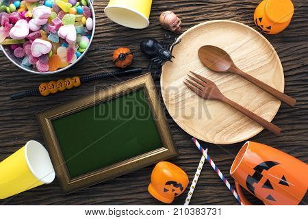 top view colorful party halloween with decor candy on wood ground
