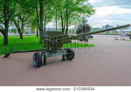 VITEBSK BELARUS - MAY 22 2017: 57-mm anti-tank gun of 1941 model ZIS-2 on Alley of military glory in park of Winners Vitebsk Belarus